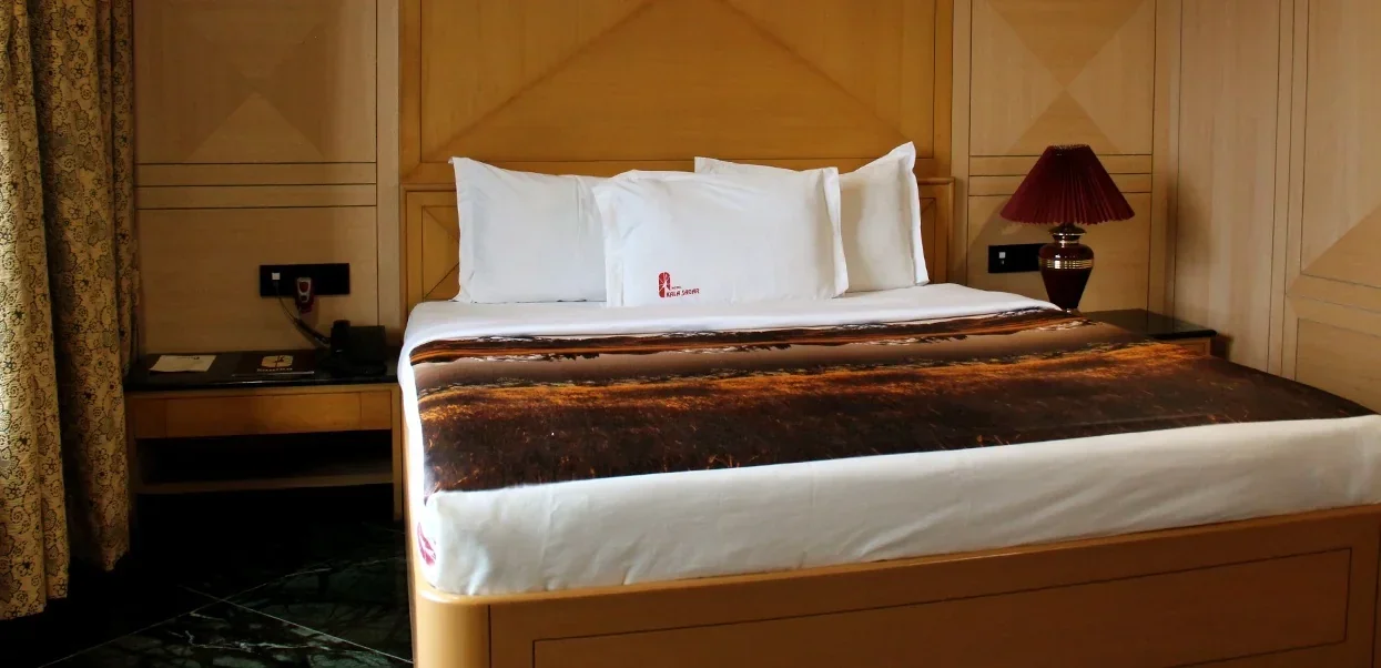 Deluxe Room at Hotel Kalasagar Pune – Book Pune Hotel Room
